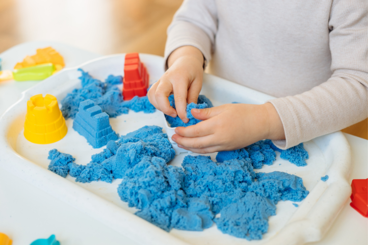 Kinetic sand is a great tactile sensory toy for kids and toddlers. Find more toys recommended by our occupational therapists in this blog!